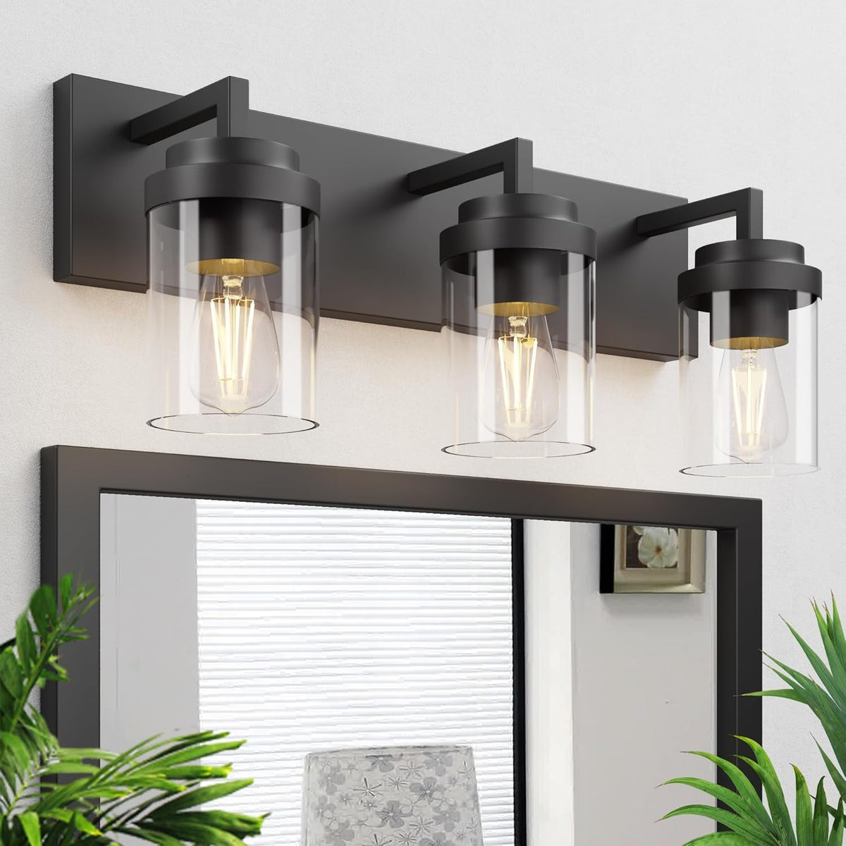 Lampada da specchio con paralume in vetro trasparente