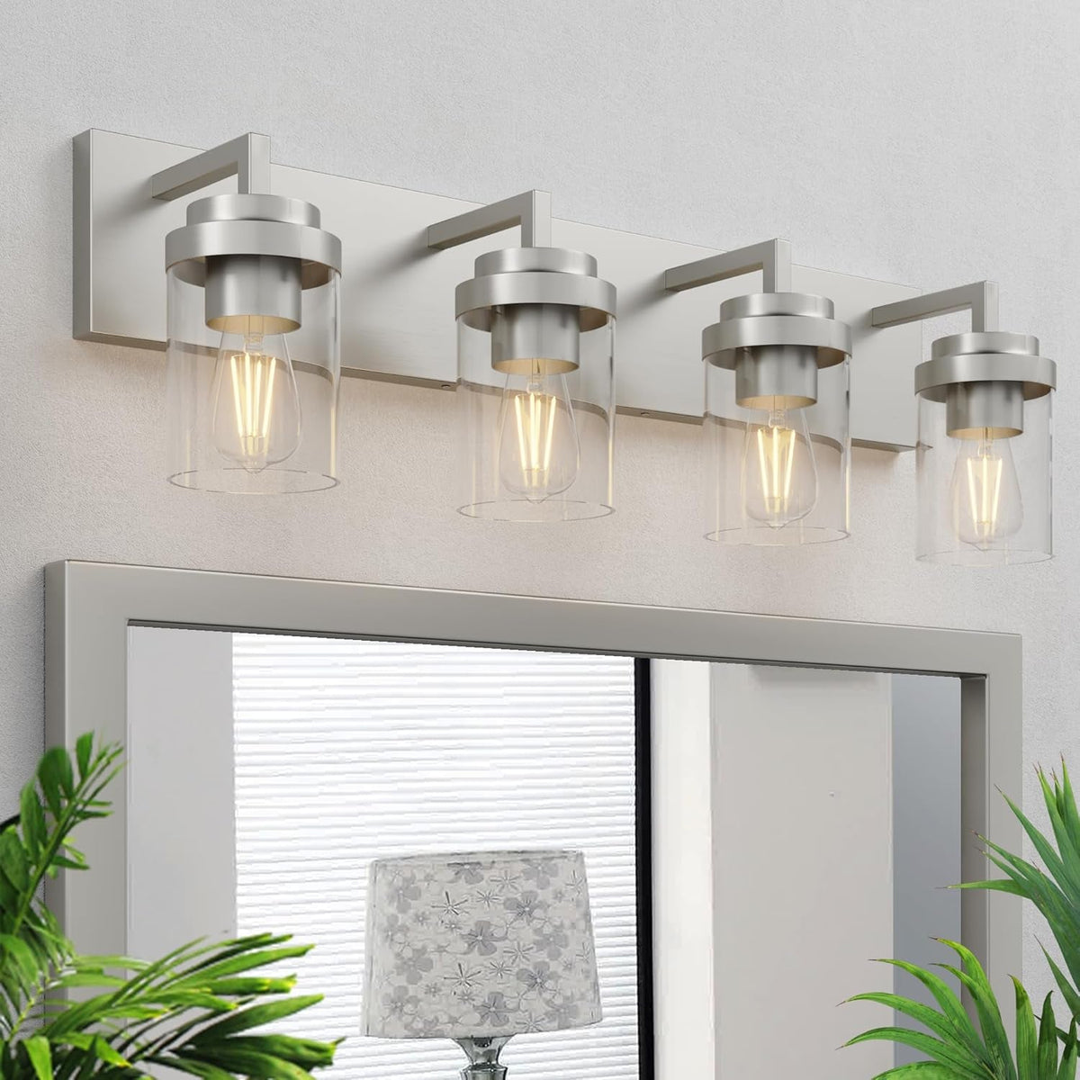 Lampada da specchio con paralume in vetro trasparente