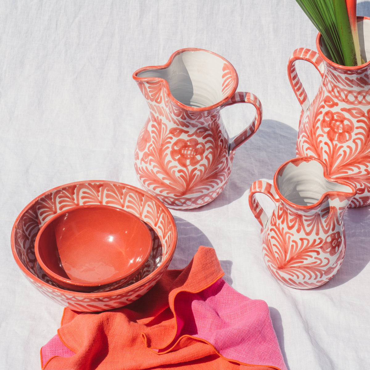 Medium pitcher with hand painted designs