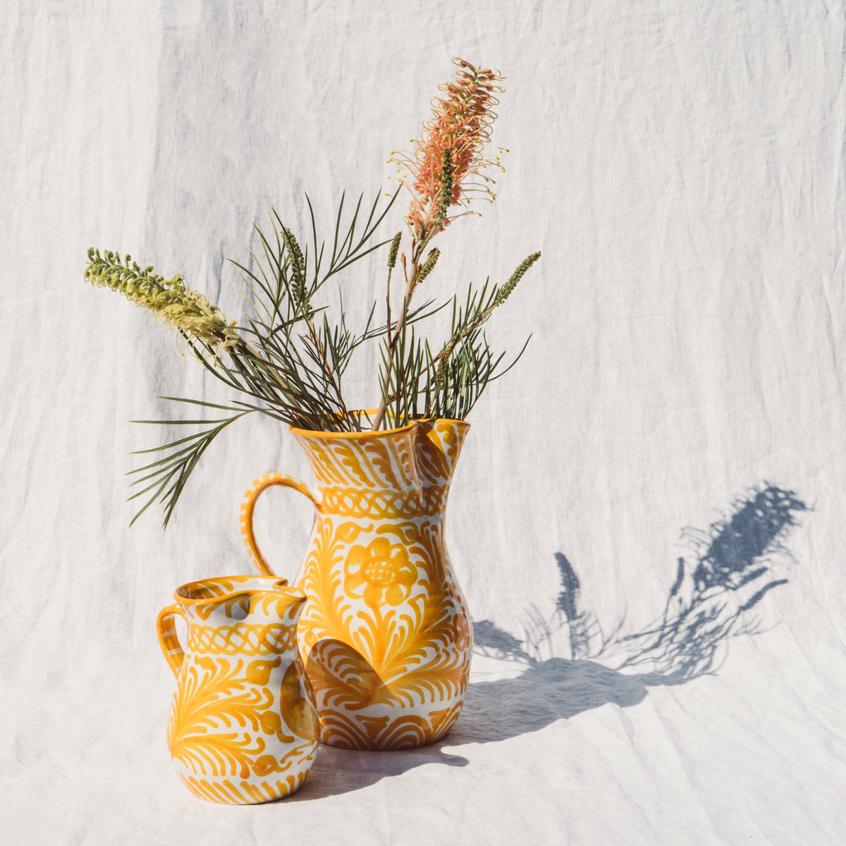 Large pitcher with hand painted designs