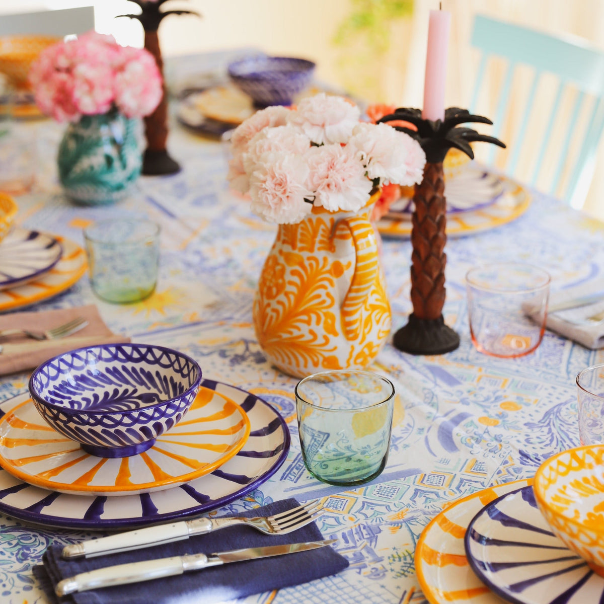 Large pitcher with hand painted designs