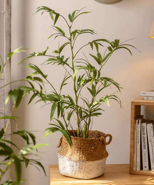 Foglie di bambù artificiali in vaso