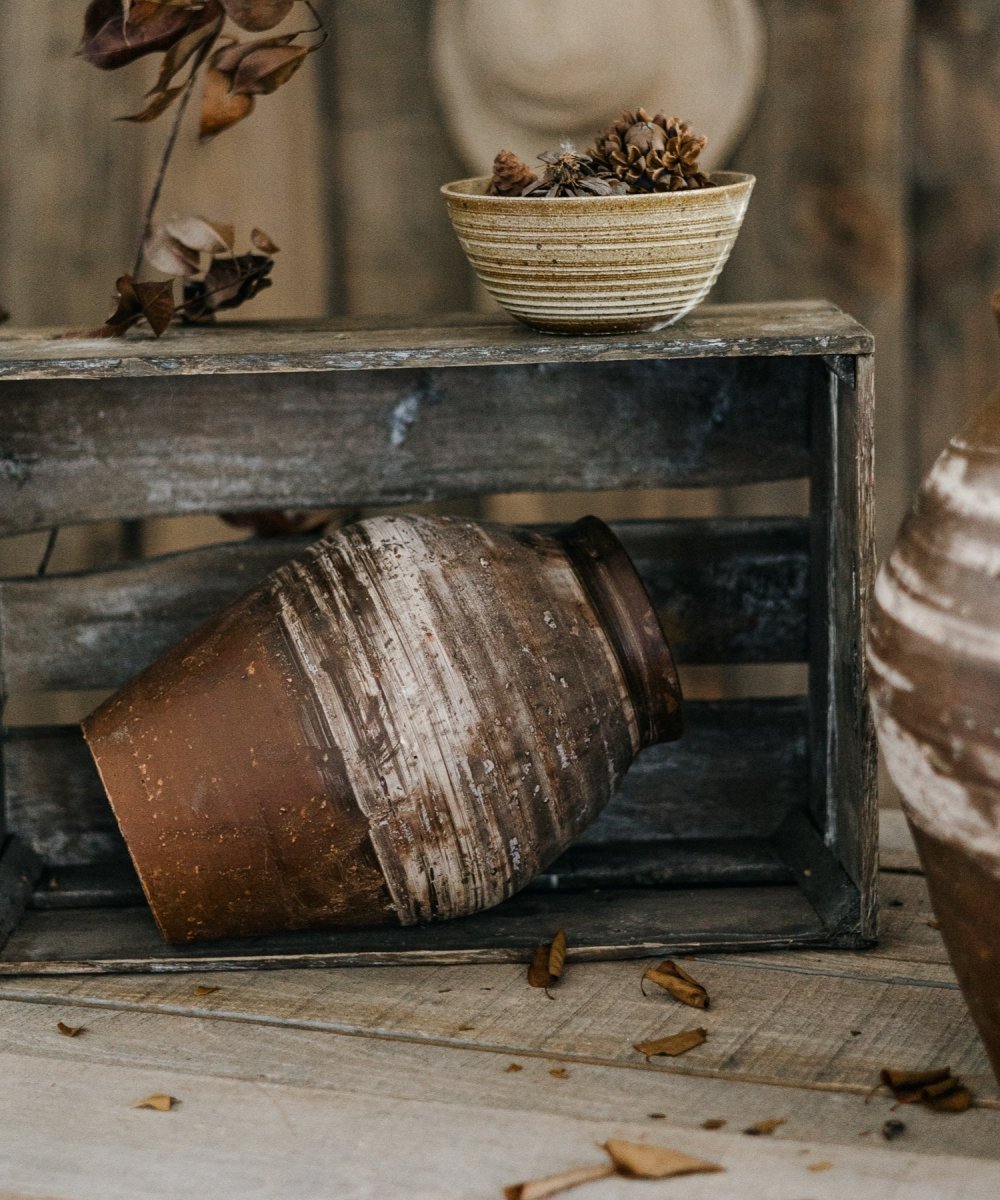 Pot en terre cuite marron de restauration