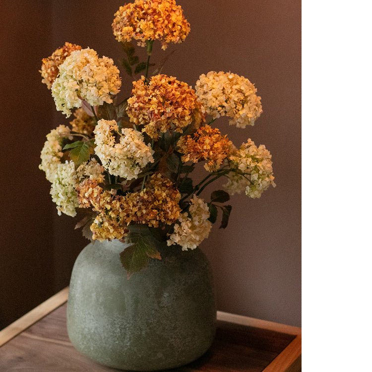 Vase en verre texturé vert foncé mat