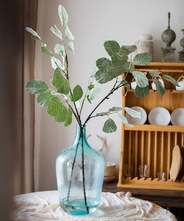 Tige de plante artificielle à grandes feuilles