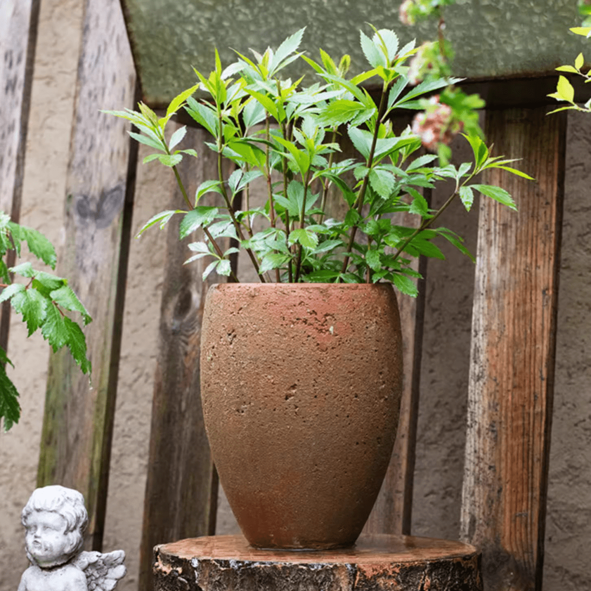 Vaso per piante in cemento effetto anticato alto