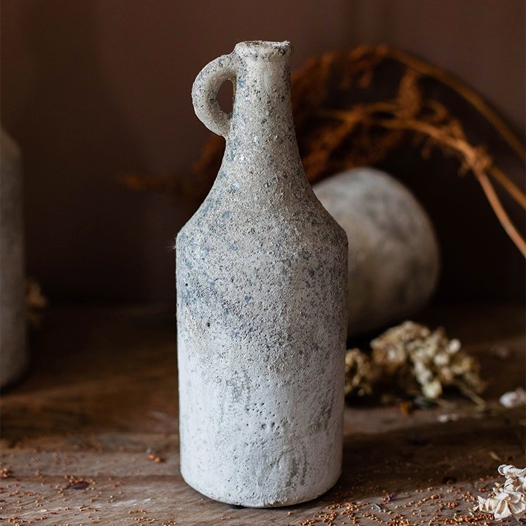 Vase à fleurs séchées à petite ouverture et texture brute