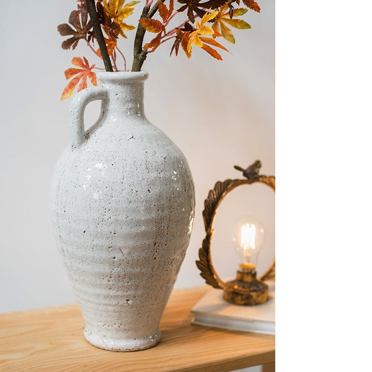 Vase en céramique blanc à petite ouverture
