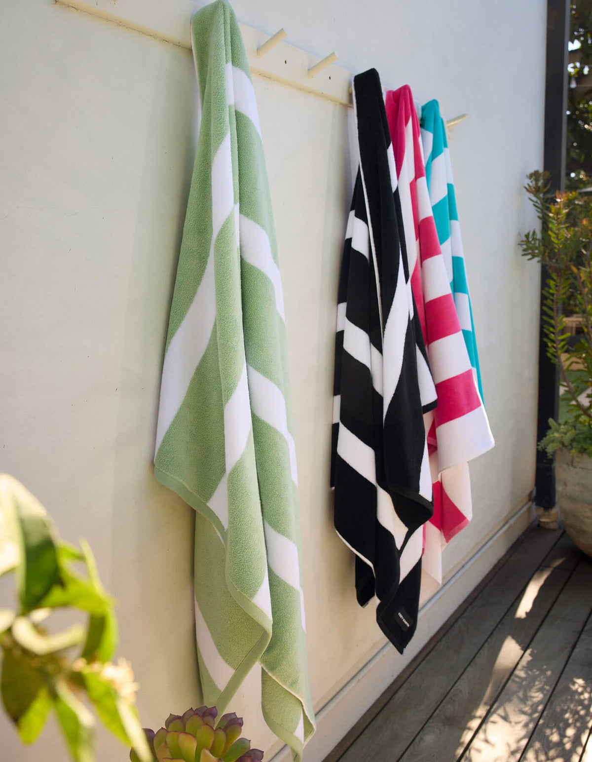 Set di teli mare a righe classiche