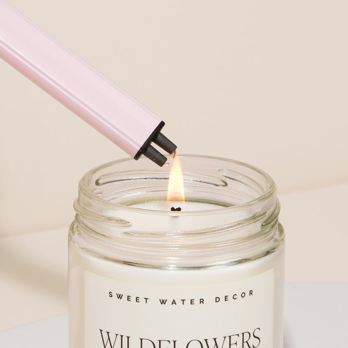 Briquet électrique rose poudré