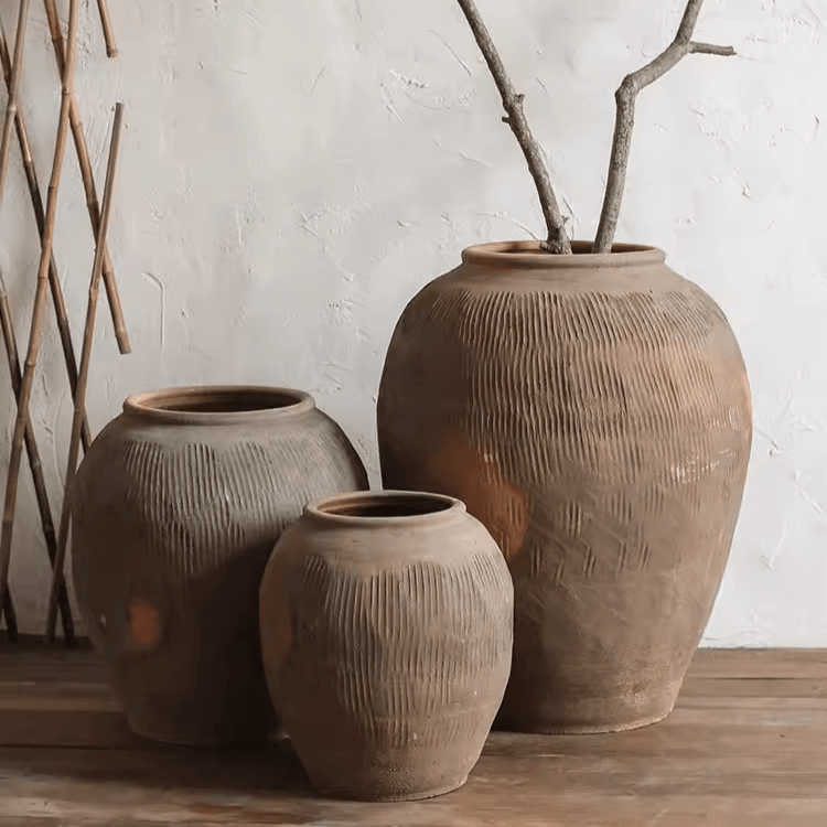 Vaso tondo in terracotta marrone