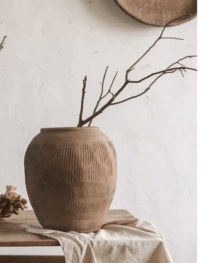 Vaso tondo in terracotta marrone