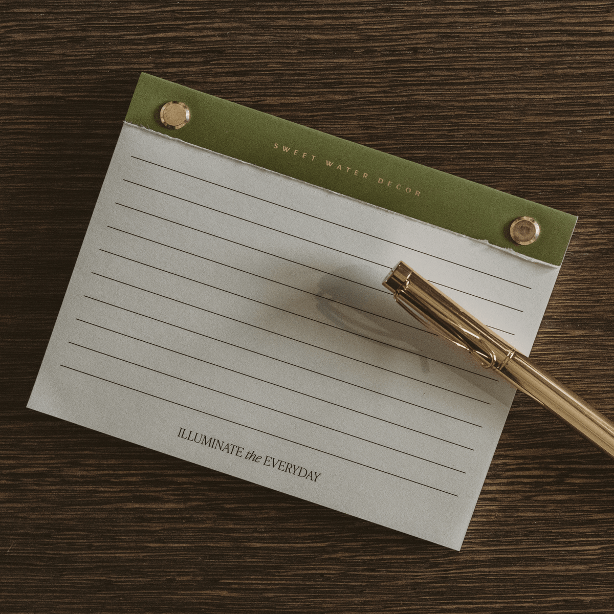 Bloc-notes base piccolo verde con rivetto dorato