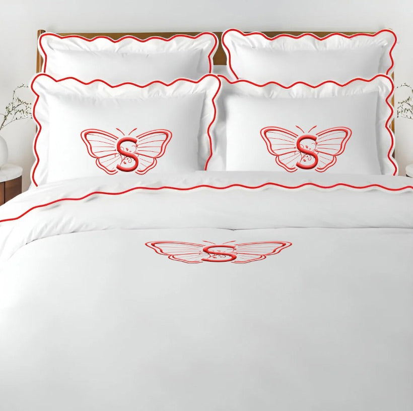 Parure de lit unie en satin de coton 400 fils avec broderie festonnée et monogramme