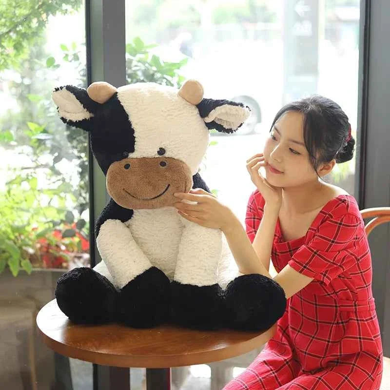 Peluche vache laitière assise Kawaii – Jouet en peluche réaliste (25–70 cm)
