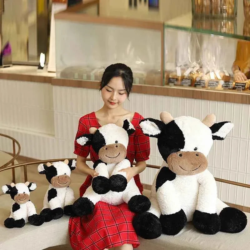 Peluche vache laitière assise Kawaii – Jouet en peluche réaliste (25–70 cm)