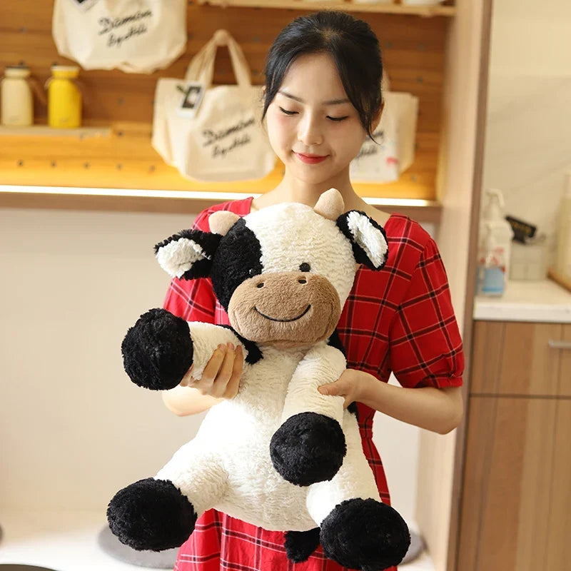 Kawaii Sitting Milk Cow Plush Toy β Lifelike Stuffed Cattle Doll (25β70cm)