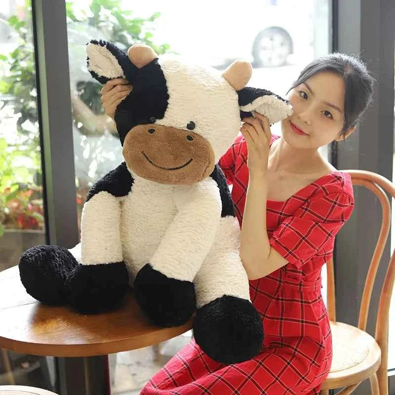 Peluche vache laitière assise Kawaii – Jouet en peluche réaliste (25–70 cm)