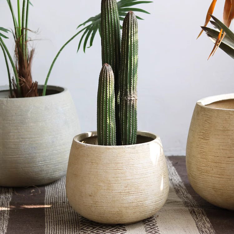 Jardinière globe en ciment rustique