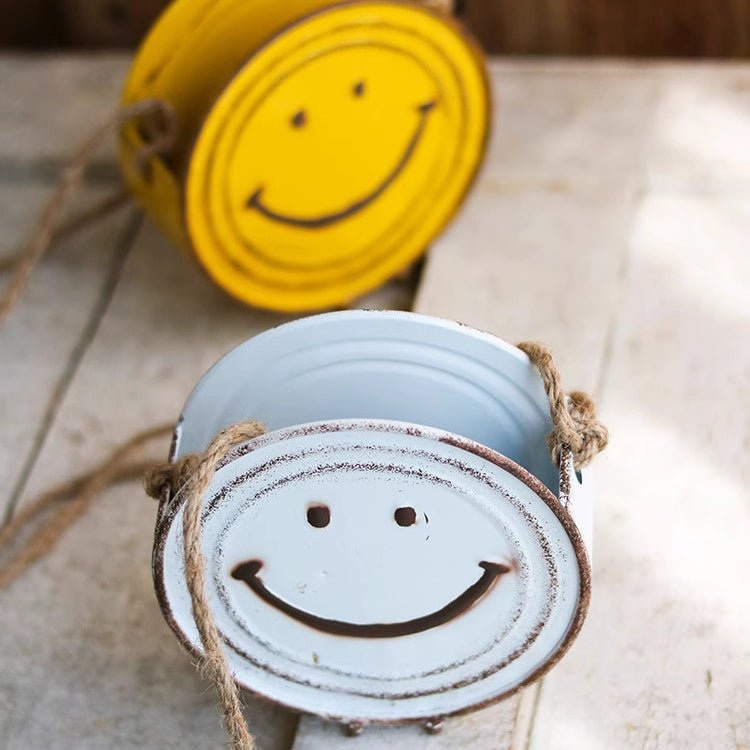 Cache-pot suspendu visage souriant