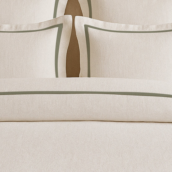 Set copripiumino in lino con bordo a cornice