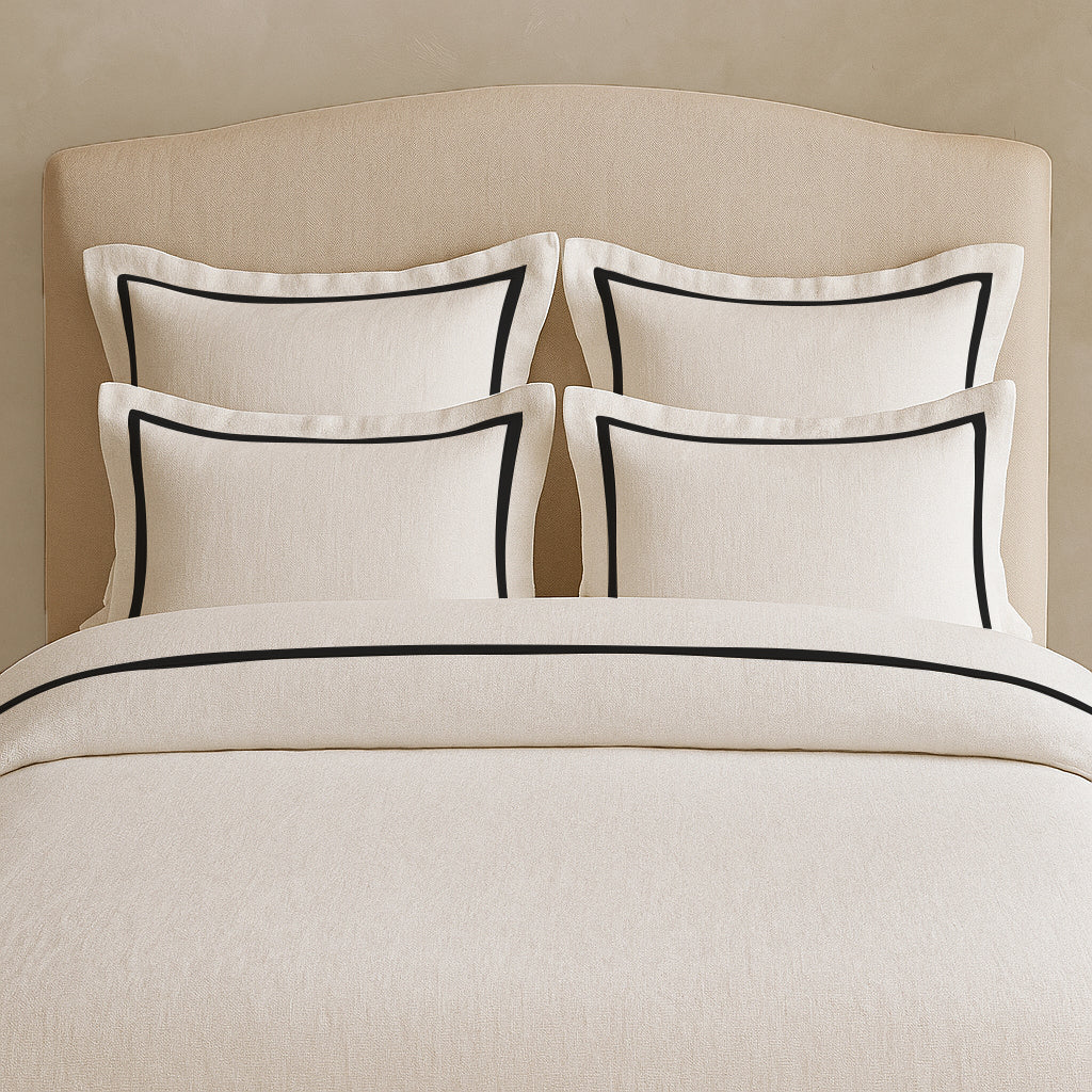 Set copripiumino in lino con bordo a cornice