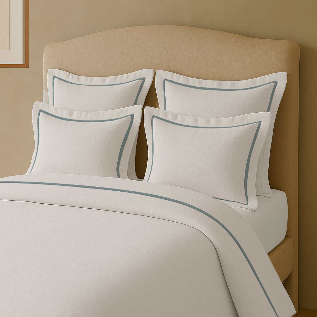 Set copripiumino in lino con bordo a cornice