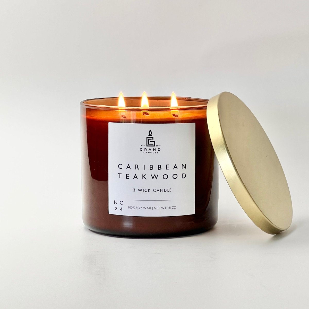 Candela di soia al legno di teak dei Caraibi