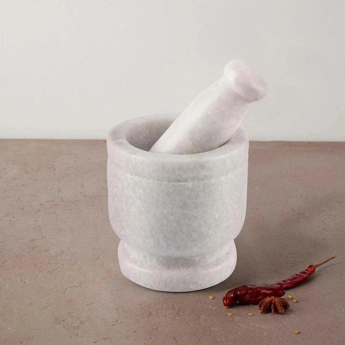 Mortier et pilon en marbre Cassia