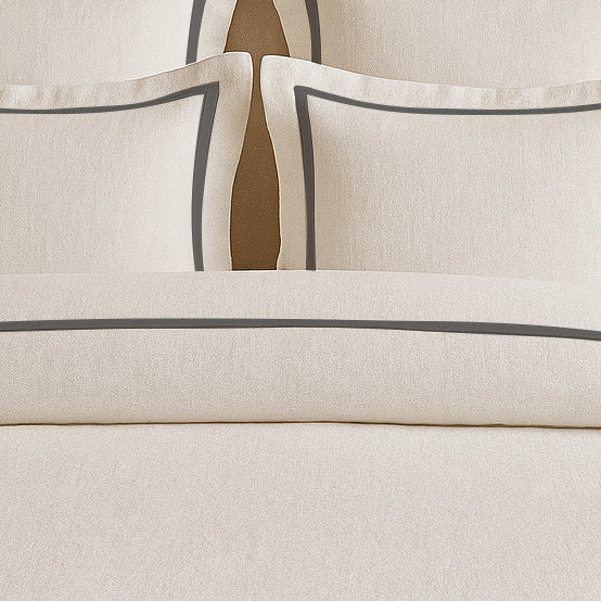 Set copripiumino in lino con bordo a cornice
