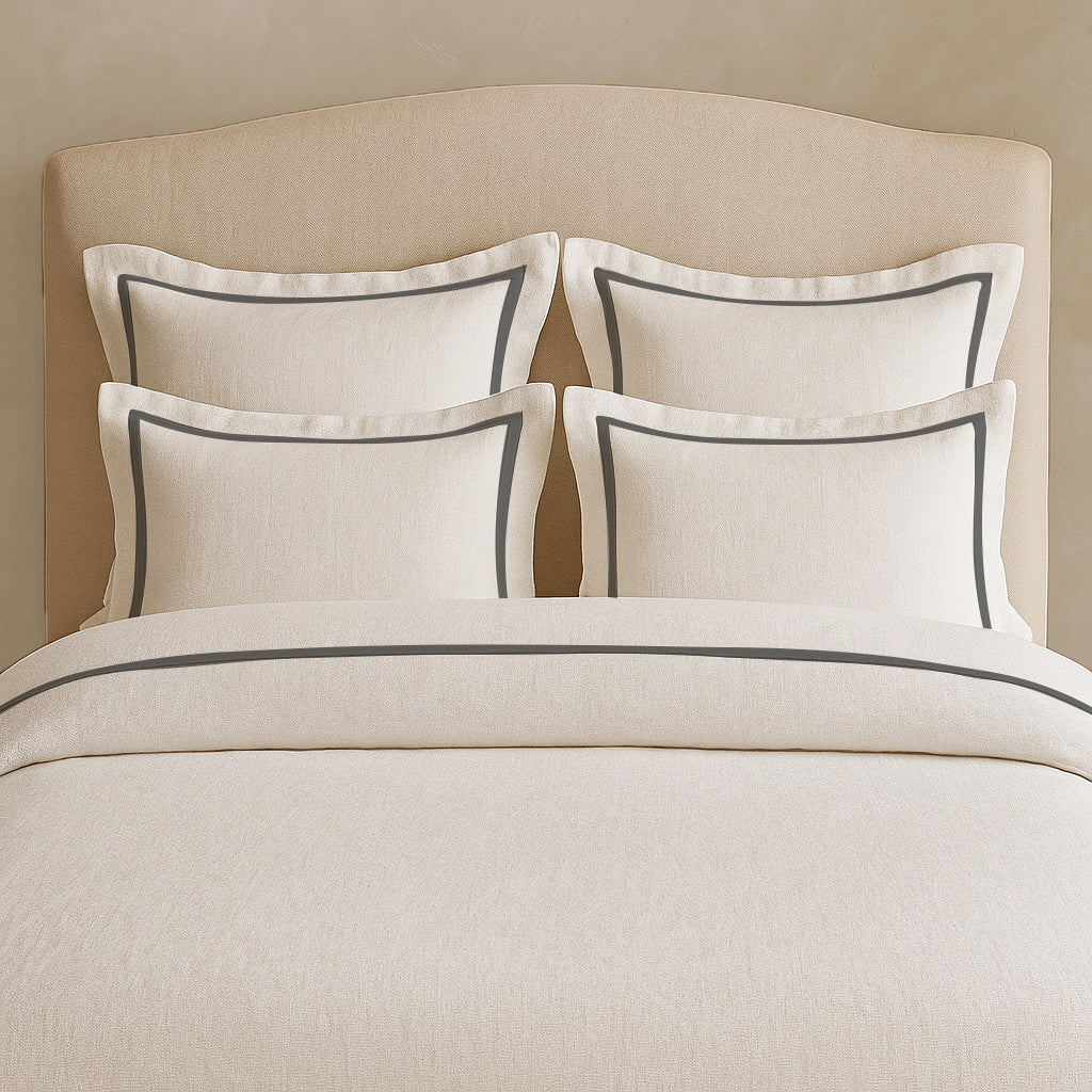 Set copripiumino in lino con bordo a cornice