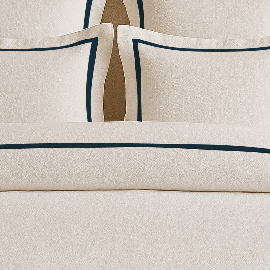 Set copripiumino in lino con bordo a cornice