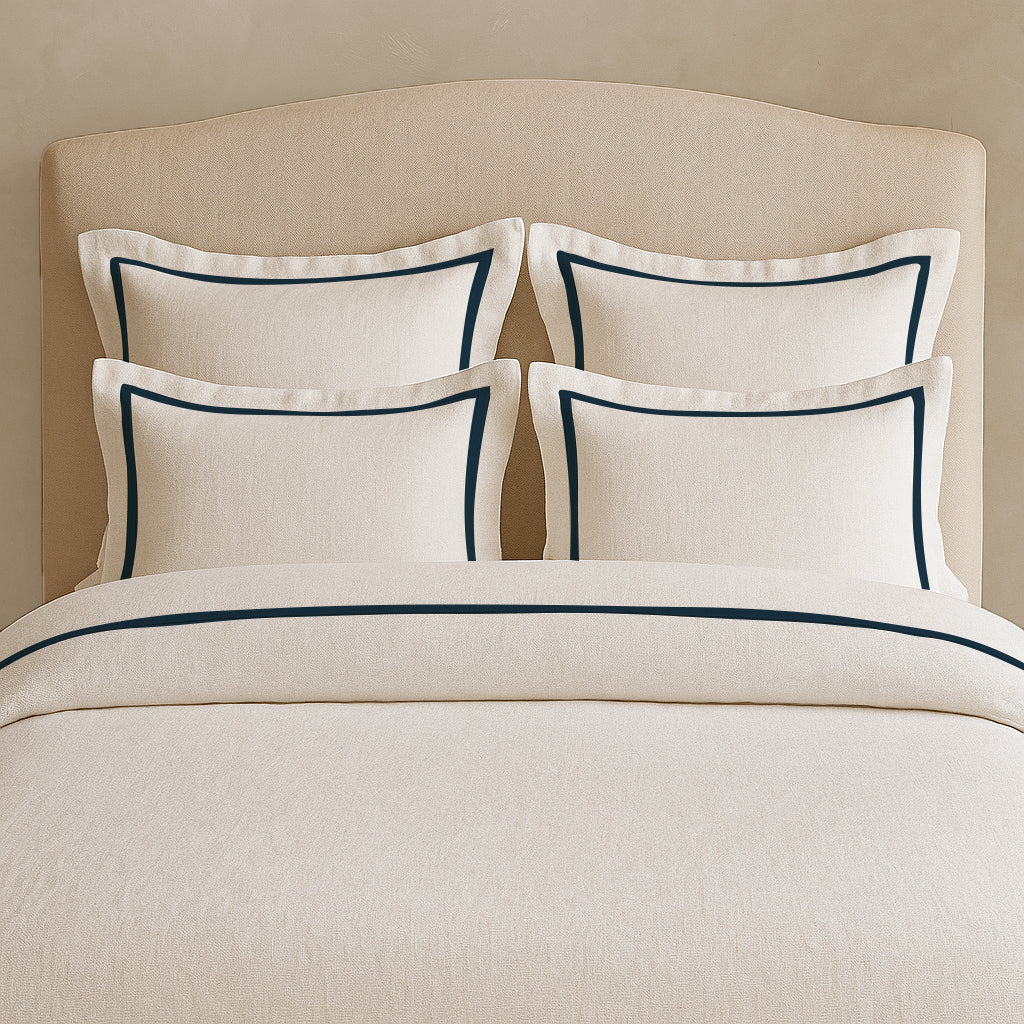 Set copripiumino in lino con bordo a cornice