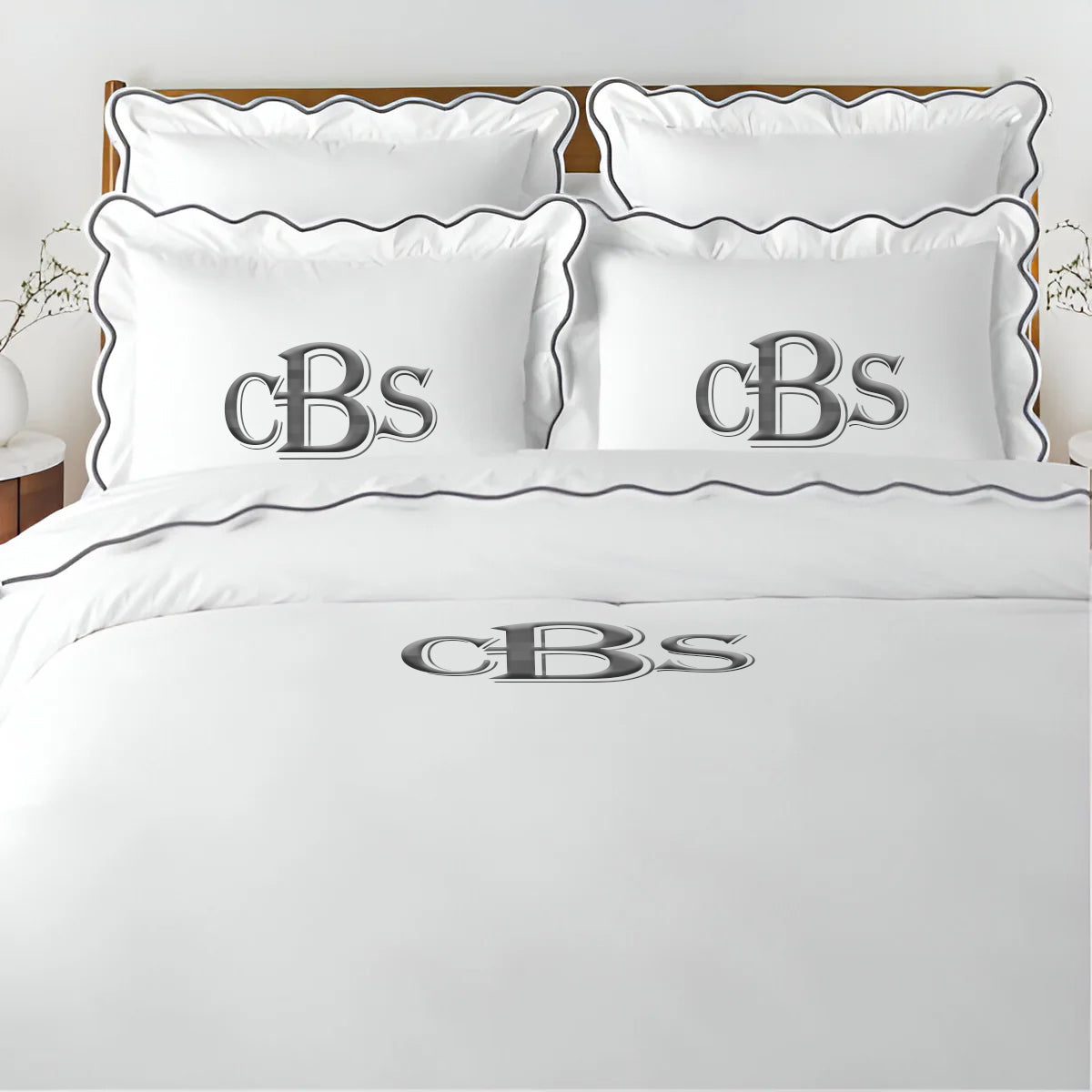 Parure de lit unie en satin de coton 400 fils avec broderie festonnée et monogramme