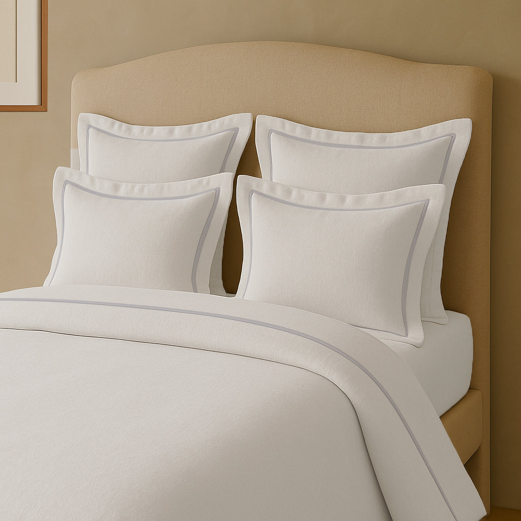 Set copripiumino in lino con bordo a cornice