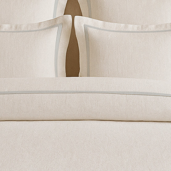 Set copripiumino in lino con bordo a cornice