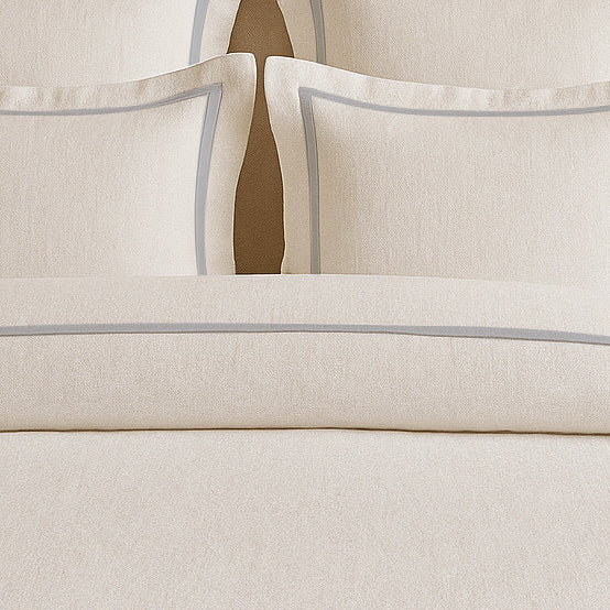 Set copripiumino in lino con bordo a cornice