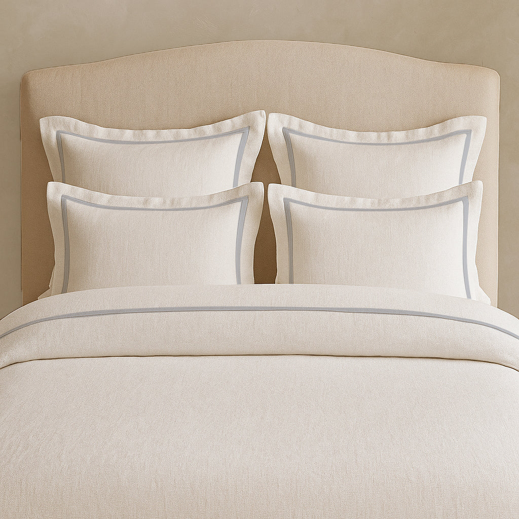 Set copripiumino in lino con bordo a cornice