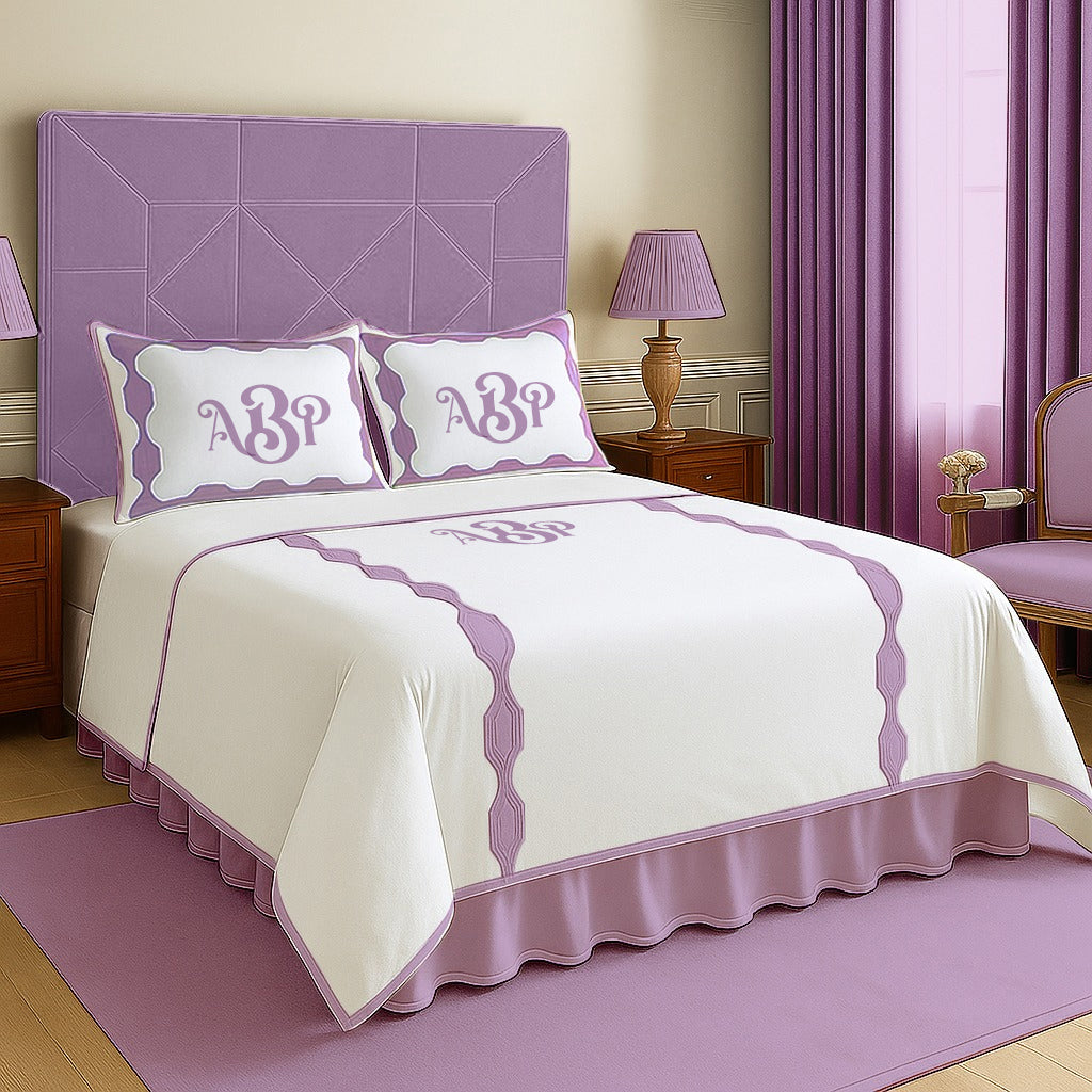 Set copripiumino in cotone con bordo applicato esagonale e monogramma