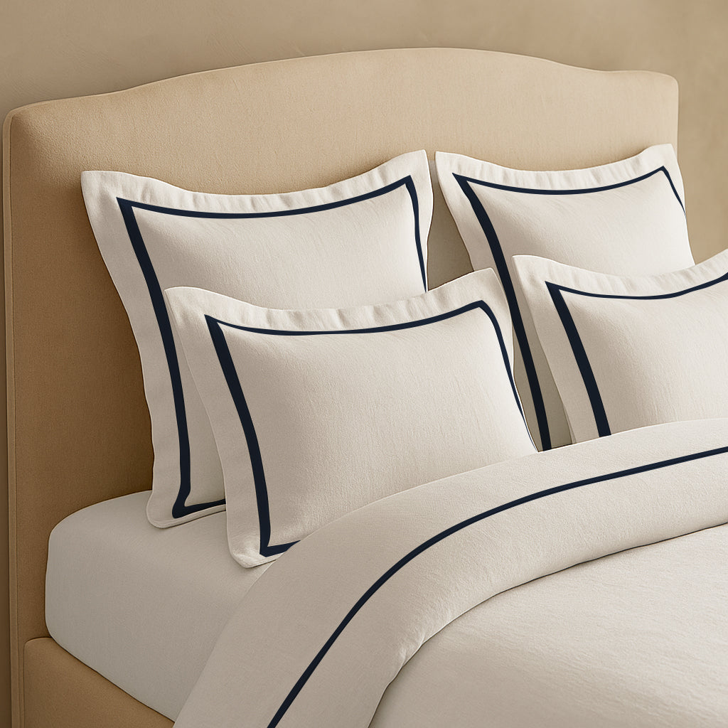 Set copripiumino in lino con bordo a cornice