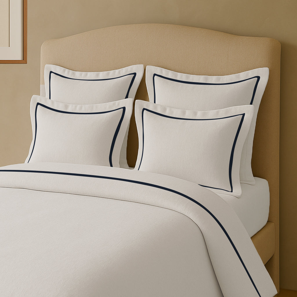 Set copripiumino in lino con bordo a cornice