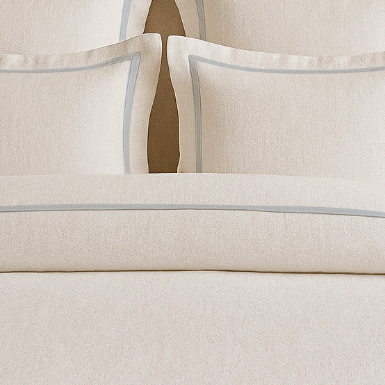 Set copripiumino in lino con bordo a cornice