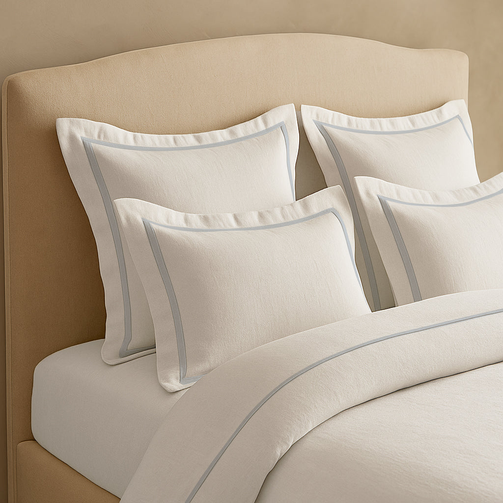 Set copripiumino in lino con bordo a cornice