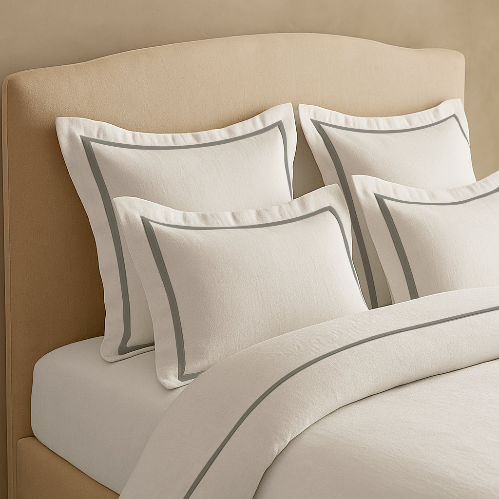 Set copripiumino in lino con bordo a cornice