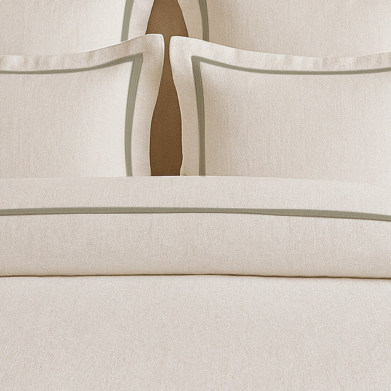 Set copripiumino in lino con bordo a cornice