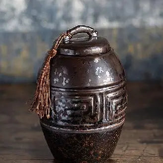 Dark Brown Ceramic Storage Canister with Brown Tassel