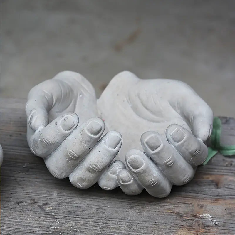 Hand-Shaped Concrete Planters