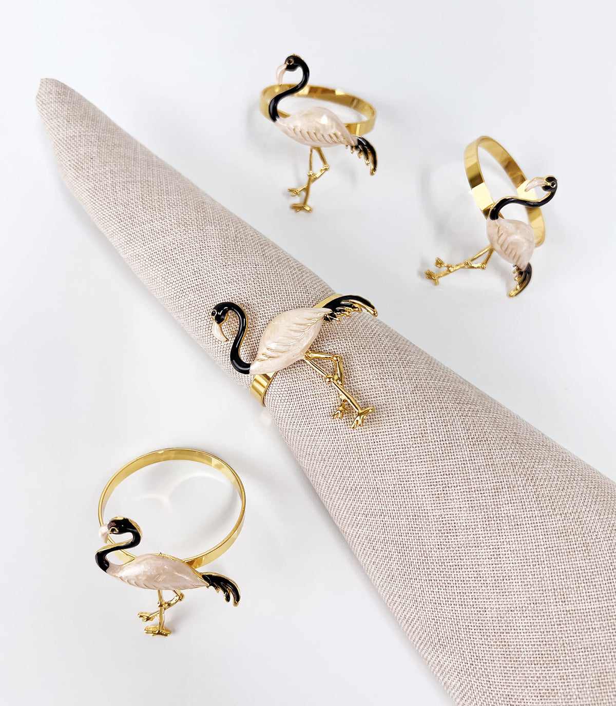 Fennco Styles Enamel Glazed Flamingo Metal Napkin Rings, Set of 4 - Beige Decorative Napkin Holders for Home, Dining Room, Banquets, Family Gatherings, Holidays and Special Occasions