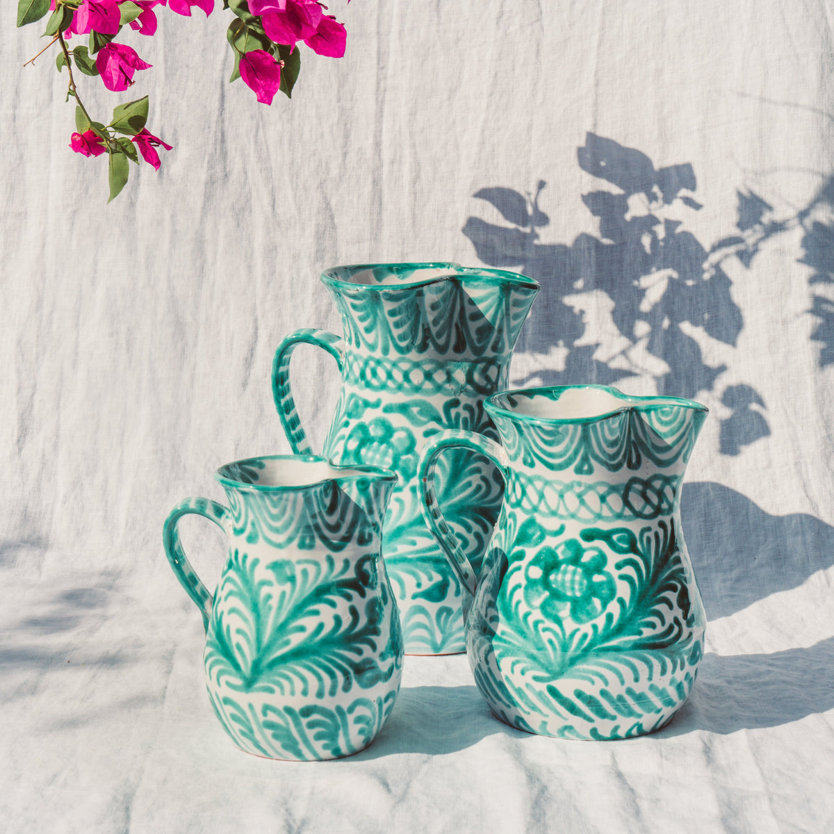 Large pitcher with hand painted designs