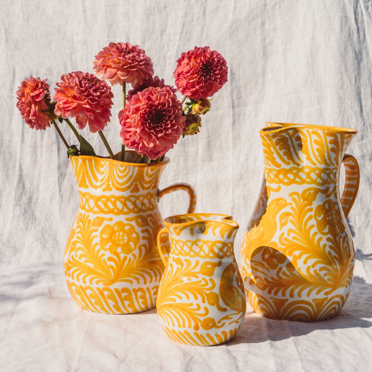 Large pitcher with hand painted designs